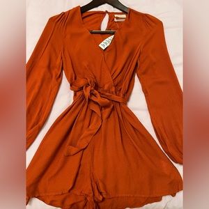 URBAN OUTFITTERS Orange long sleeve romper